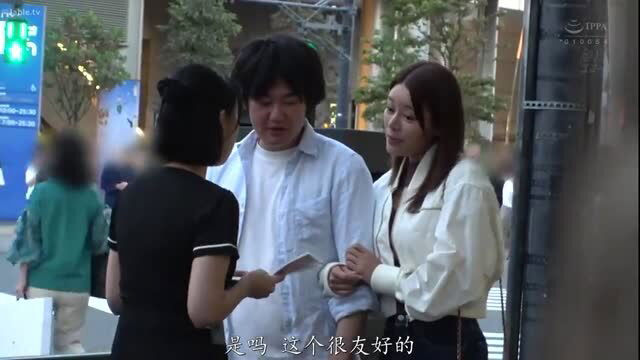 Japanese women chatting outdoors with man, casual street talk