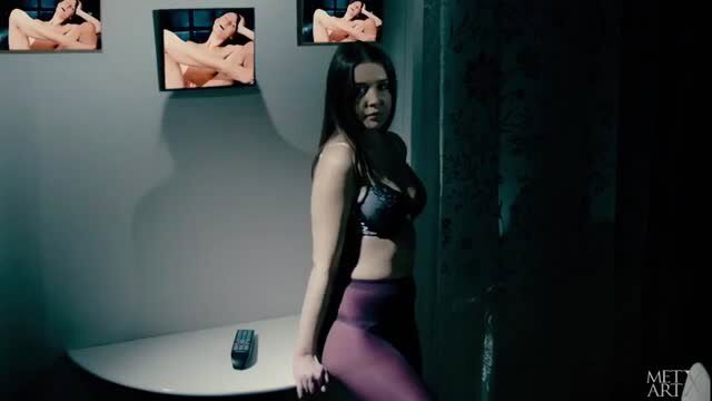 All natural brunette with nice tits in lingerie poses sexy