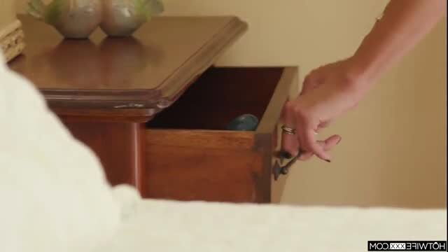 Armani Black hand in drawer by bed, sexy tease