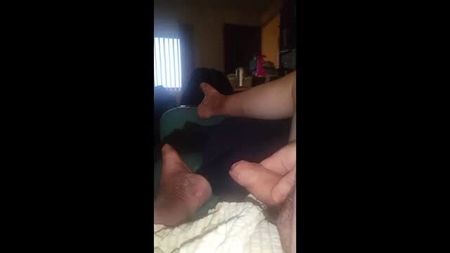 Amateur POV footjob with thick white cock and female feet