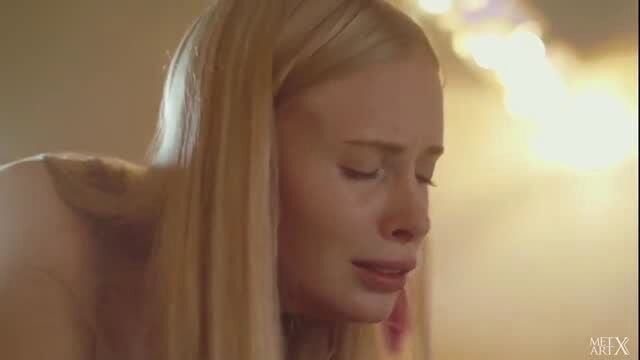 Blonde babe crying tears of joy in sensual naked flower play