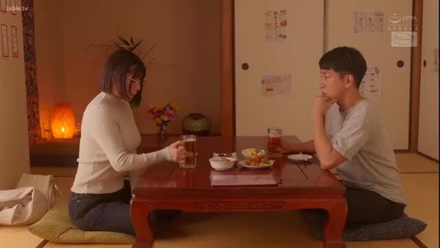 Shy glasses Japanese junior drinking beer with coworker at table