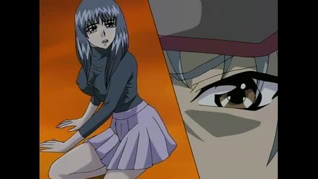 Blue-haired JAV schoolgirl in turtleneck and miniskirt kneels seductively, close-up eye view