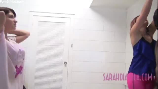 Sarah Diavola & Amadahy in lingerie stretching arms up teasing