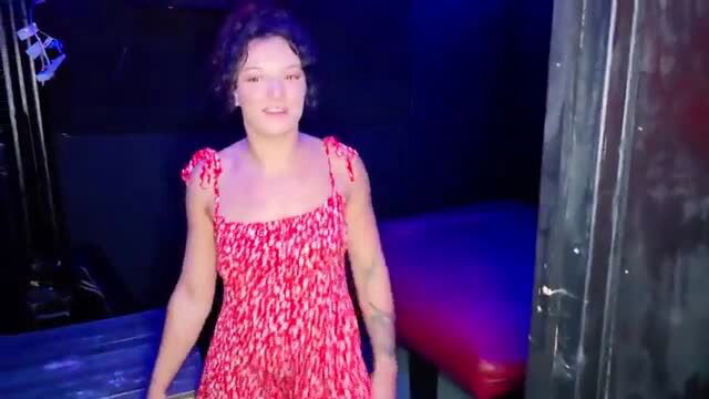 Dakota Marr in red dress at porn theater exhibitionist debut