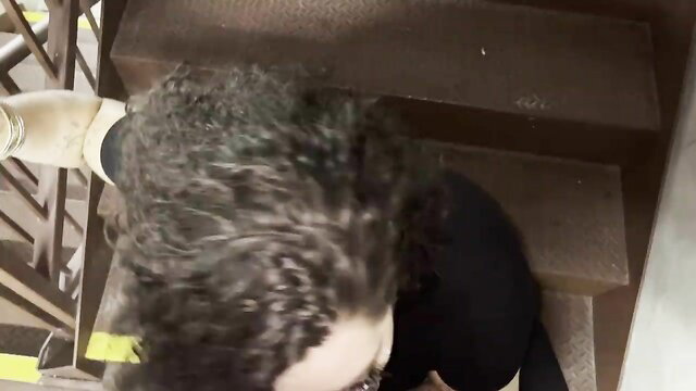 Msthroatmagic kneels sucking big black cock in stairwell