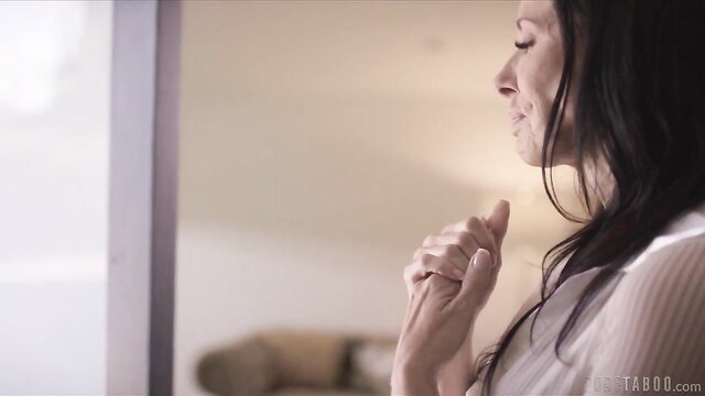 Reagan Foxx seductive pose in sheer top, closeup profile