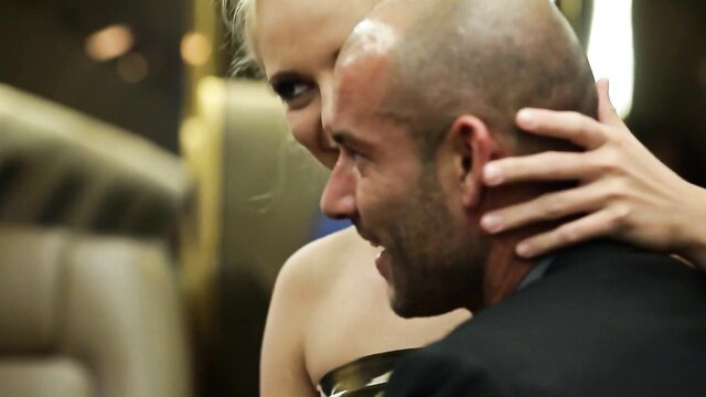 Claire Castel kisses bald hunk passionately in elegant embrace