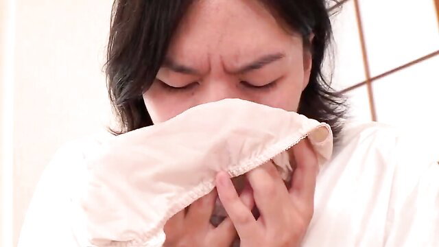 Nanao Nakano JAV aunt sneezes into tissue, gentle face closeup