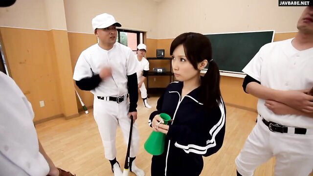Japanese schoolgirl in tracksuit surrounded by baseball team JAV thumbnail