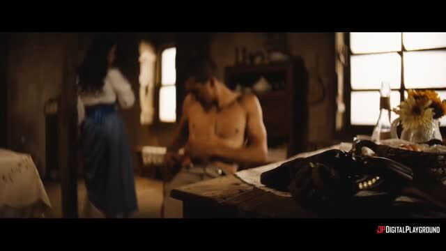 Busty brunette in dress watches buff Latino hunk shirtless cleaning gun