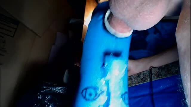 homemade sex toy with eye tattoo being used