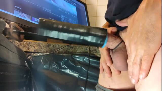 Amateur guy wanks with taped dildo on cock closeup practice view