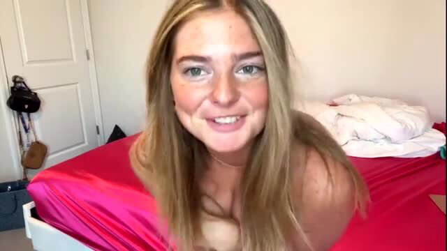 luluxoxo3 blonde topless amateur on pink satin sheets smiling