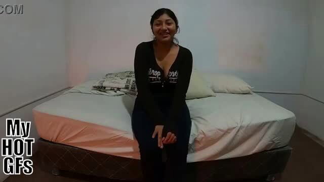 Kiomi in deep cleavage black top on bed, hot chubby amateur tease