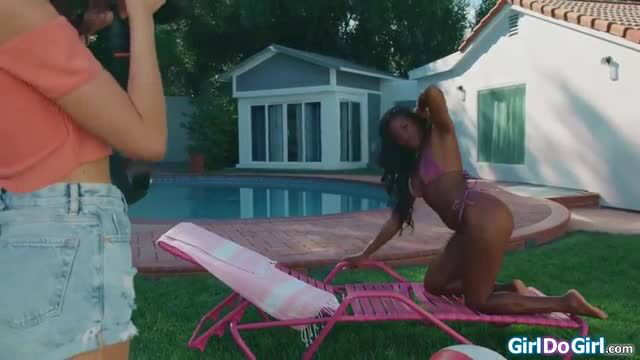 Nicole Kitt in pink bikini poses sexy at poolside photoshoot