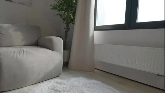 Yessasha1's cozy room with grey armchair, plant, fluffy rug