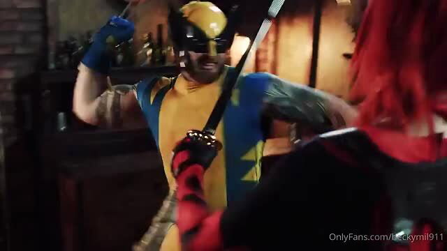 Rebecca Goodwin cosplay as Deadpool with Wolverine in adult scene