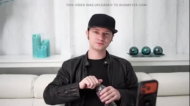 Alex Jett in black leather jacket and cap during Trike Patrol interview