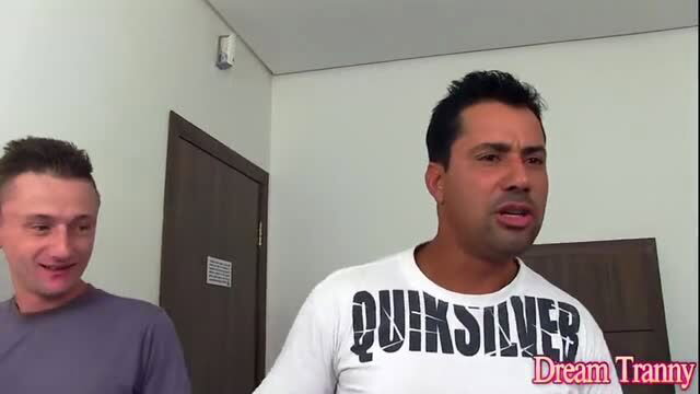 Amanda Fialho in white Quiksilver shirt with male costar in adult video thumbnail