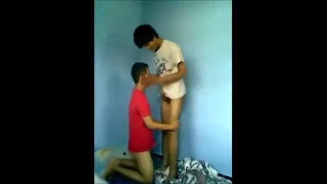 Two young Asian men in amateur gay oral sex scene