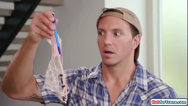 Leah Hayes shemale in white lace lingerie with blue pen, surprised expression
