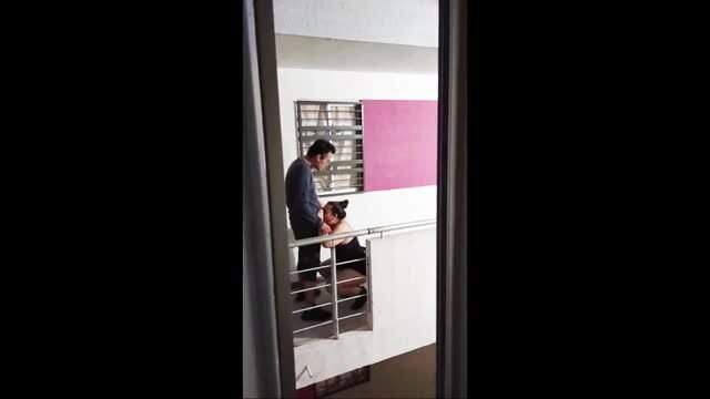 Exhibitionist couple having sex on balcony, public neighbor view