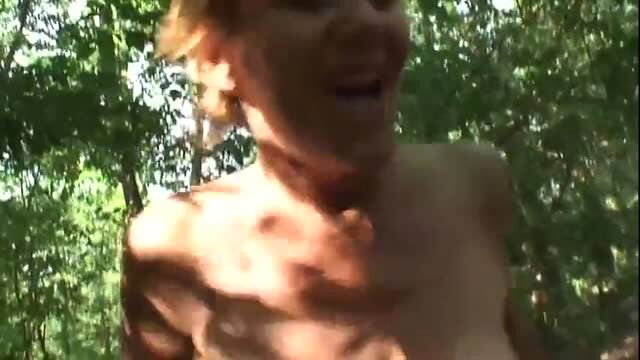 Hairy mature woman outdoors smiling in sunlight