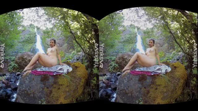 Naked amateur babe rubbing her clit outdoors by a waterfall in 3D VR