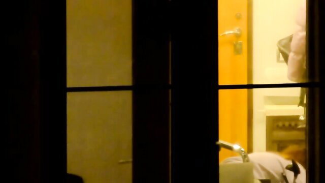 Blurry voyeur view of woman's big ass bending over sink in bathroom