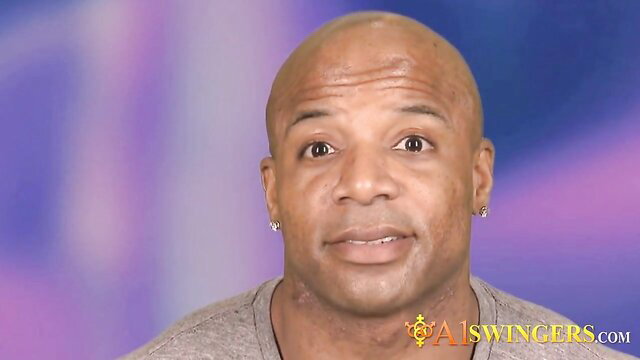 Bald Black man smiling in swinger video thumbnail