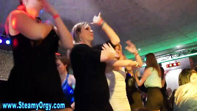 Group of dirty CFNM sluts dancing wildly at party, drenched in fun