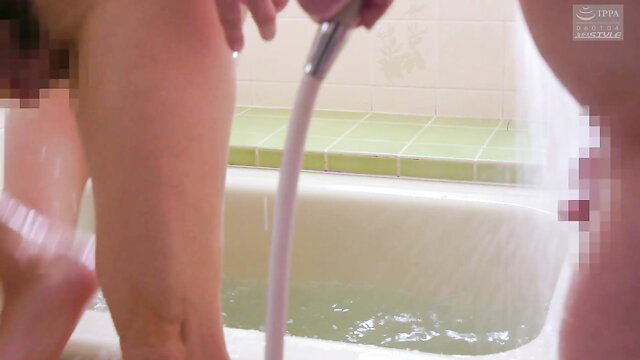 Yumika Saeki JAV enema play in bathtub, hose insertion