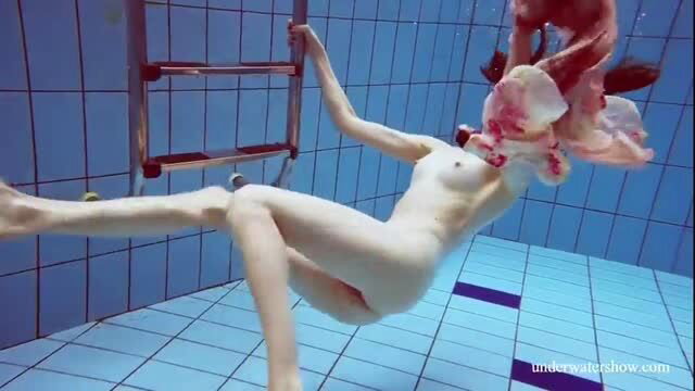 Martina redhead model swimming nude underwater with artistic effects