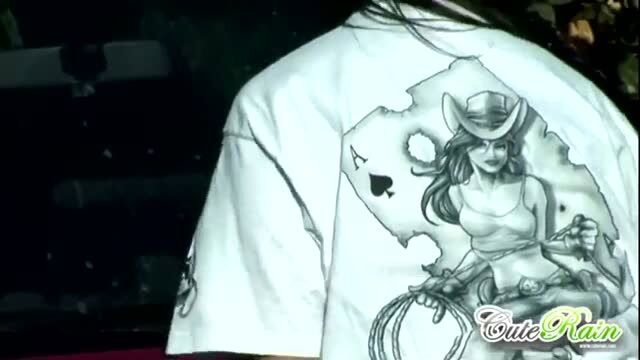 Cute Rain in cowboy graphic t-shirt, back view