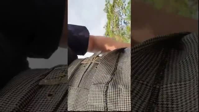 Indian Aunty in checkered dress lifting skirt outdoors