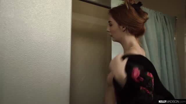 Megan Winters redhead teen taking off black top in shower