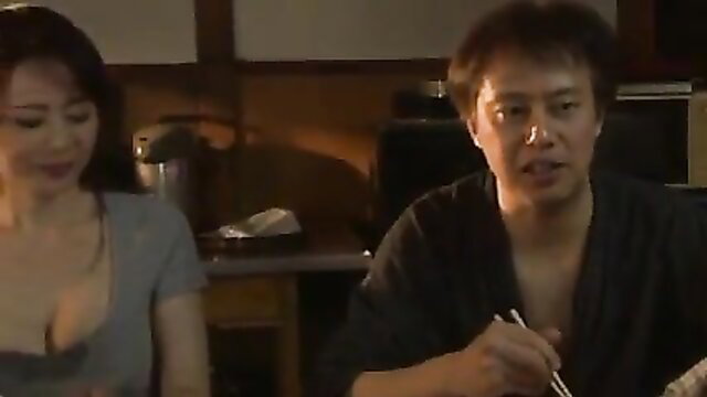 Japanese stepmom in gray dress with busty cleavage eats with man in kimono