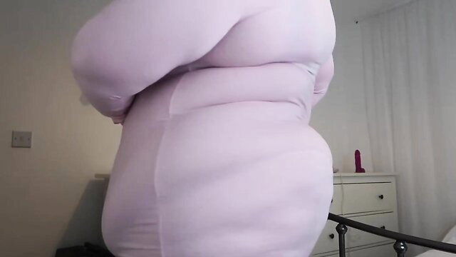 Fat Barbie in tight pink bodysuit, thick curves and huge tits from behind