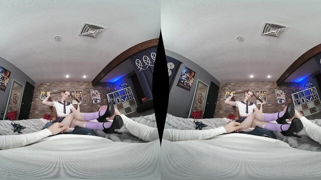 Erin Everheart in Dragon Ball Z cosplay spreads legs in stockings on bed