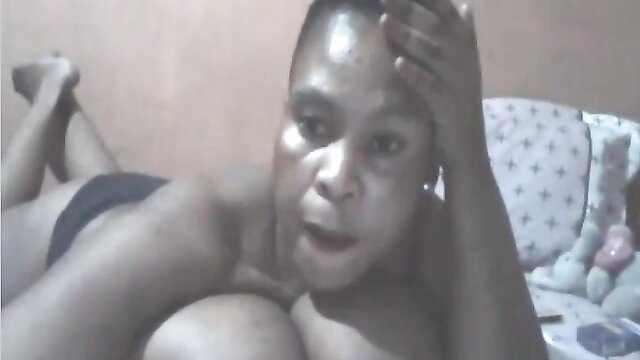 Thick black amateur hoe watermello69 lying nude on bed showing big tits