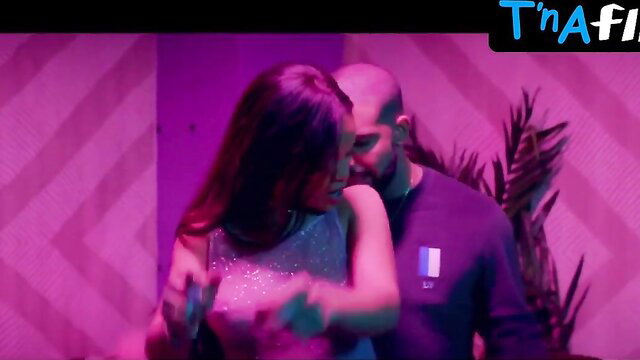 Rihanna lookalike sexy couple dance embrace in sparkling dress