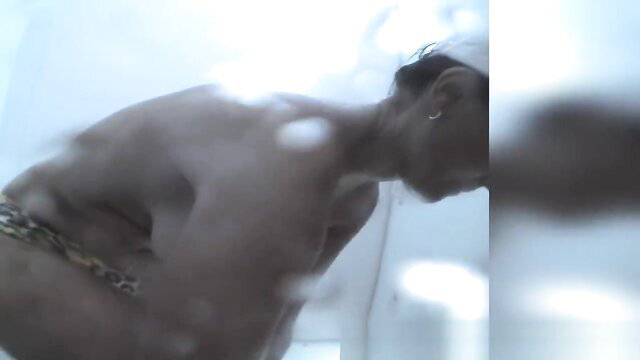 Blurry voyeur spy cam of nude Asian amateur bending over in changing room