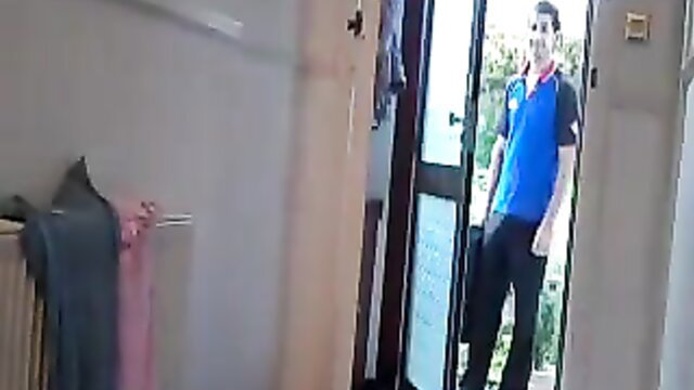 Hot brunette flashing tits to delivery boy at door