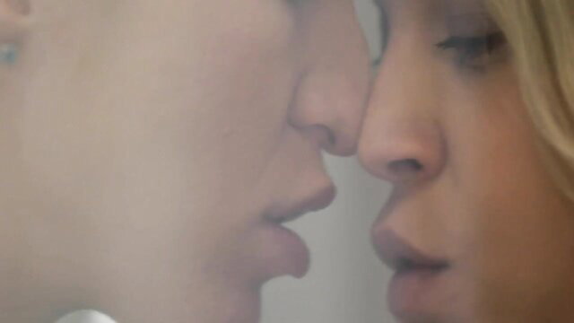 Elena Vedem and Angelika Grays blonde lesbians kissing intimately