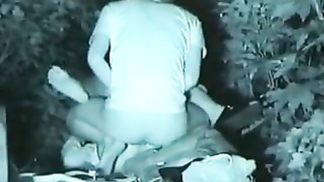 Japanese couple outdoor night sex, man on top missionary in bushes