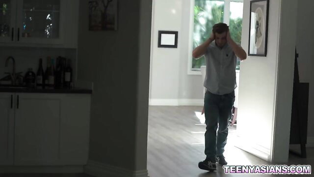 Kimora Quin petite teen Asian in kitchen doorway