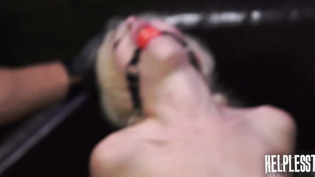 Blonde Piper Perri gagged helpless, head held back in bondage