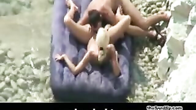 Hot blonde nudist fucked on floatie by guy in outdoor water scene