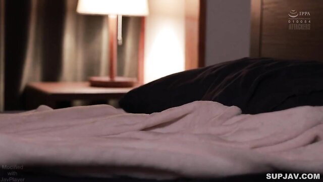 Amemiya in bed, soft lighting, teasing sheets glimpse JAV thumbnail